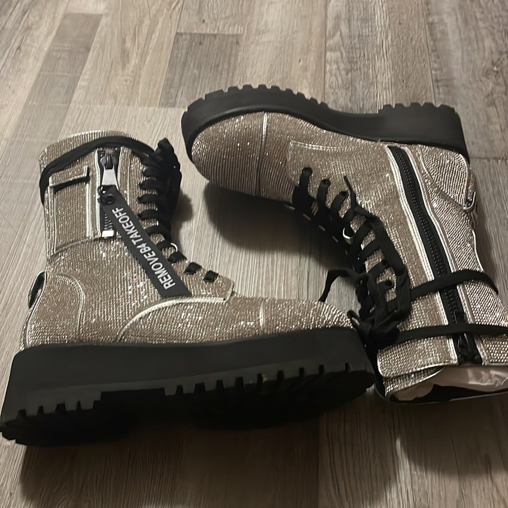 Brand: Poster Girl Color: Silver Bling Size: 8M purchased from Dolls Kill